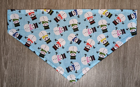 NOW HALF PRICE ! All 2023 Christmas designs half price! Reversible Dog Bandana, size Medium. Snow man on pale blue background one side, small gingerbread man motif on the other.